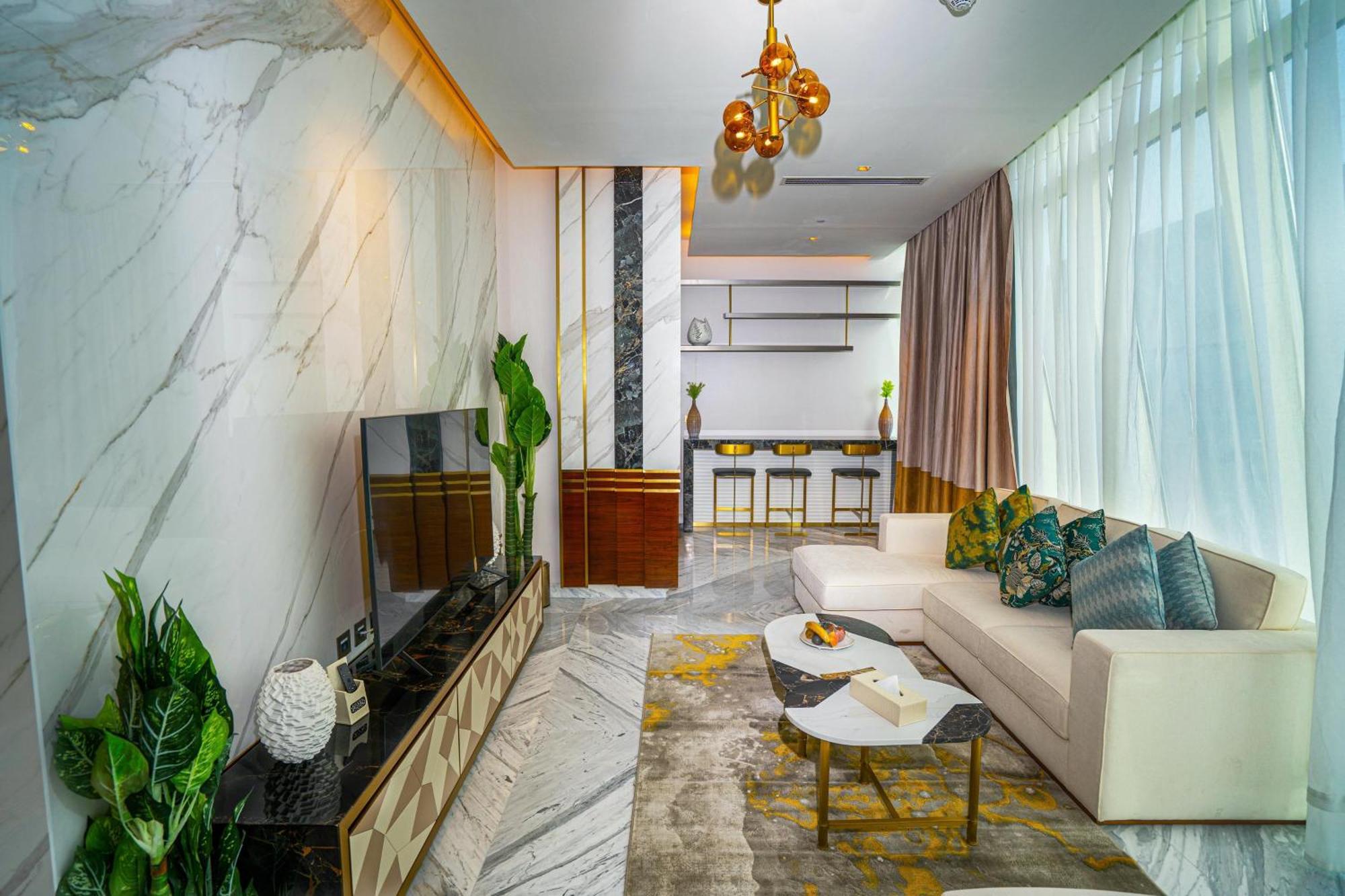 Velero Hotel Doha Lusail Εξωτερικό φωτογραφία The interior of a suite at the hotel